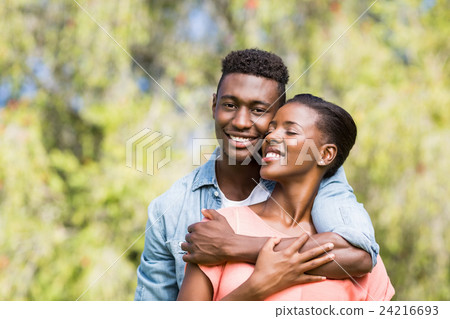 Happy couple posing together Happy couple posing together 24216693