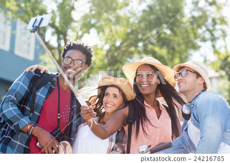 Group of friends taking selfie 24216785
