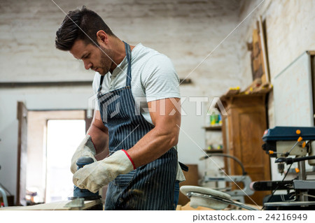 Carpenter working on his craft Carpenter working on his craft 24216949