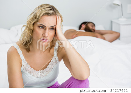 Woman upset with man after a fight Woman upset with man after a fight 24217431