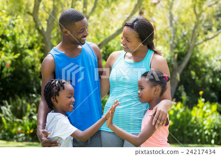 Happy family posing together Happy family posing together 24217434
