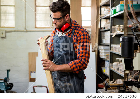 Carpenter working on his craft 24217536