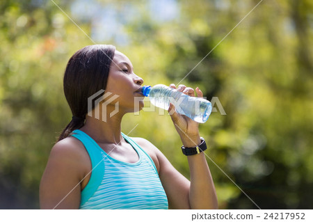 Woman drinking water 24217952