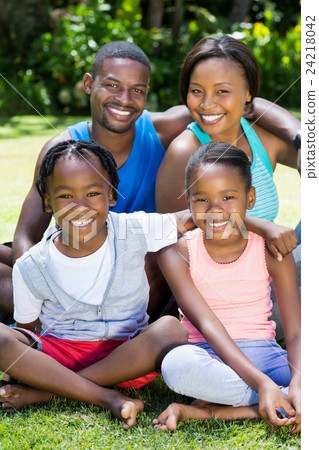 Happy family posing together Happy family posing together 24218042