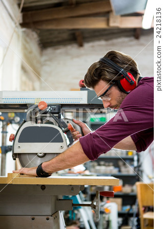 Carpenter working on his craft Carpenter working on his craft 24218136