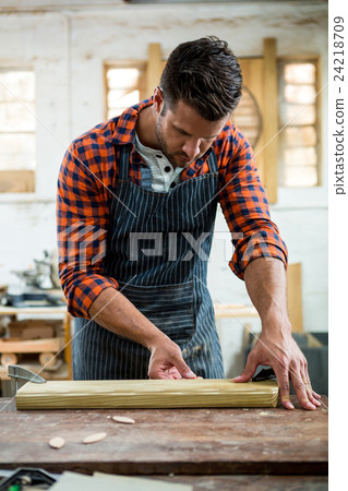 Carpenter working on his craft Carpenter working on his craft 24218709