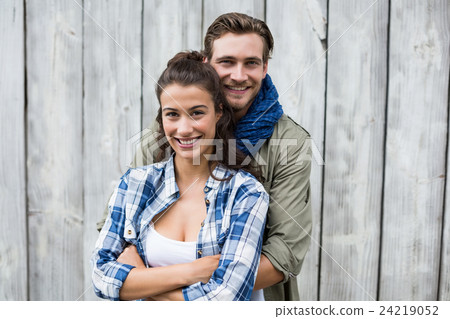 Young couple embracing each other Young couple embracing each other 24219052
