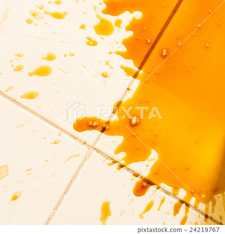 Spilled coffee on the floor 24219767