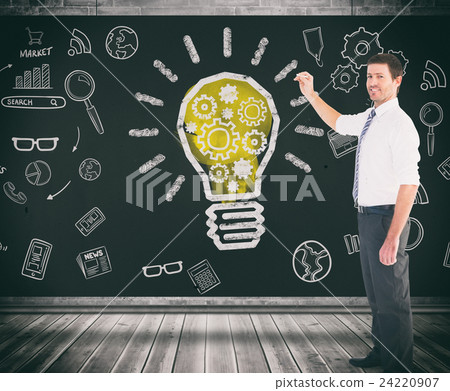 Composite image of businessman standing with his briefcase Composite image of businessman standing with his briefcase 24220907