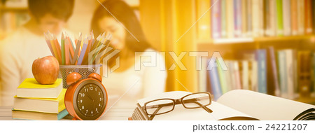 Composite image of school supplies on desk Composite image of school supplies on desk 24221207