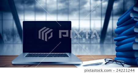 Composite image of desk with laptop Composite image of desk with laptop 24221244