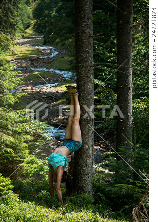 girl with nice body stands on the head during yoga girl with nice body stands on the head during yoga 24221873