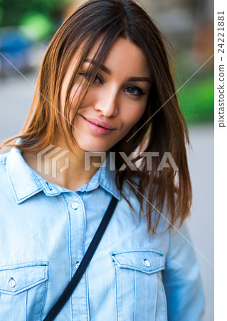Portrait face of an young fashion brunette model Portrait face of an young fashion brunette model 24221881