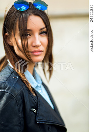Portrait face of an young fashion brunette model Portrait face of an young fashion brunette model 24221883