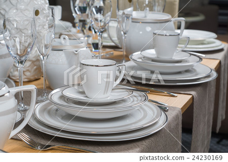 white luxury ceramic dinner service on table white luxury ceramic dinner service on table 24230169