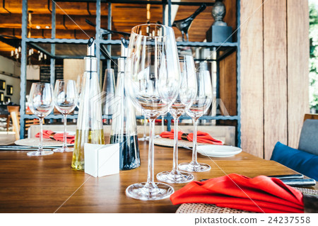 Wine glass and table setting 24237558