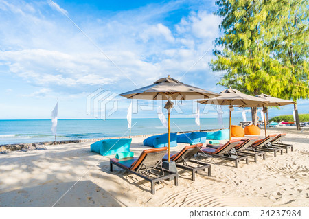 Umbrella and chair 24237984
