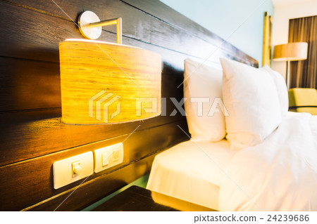 White pillow on bed 24239686