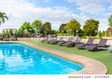 chair side swimming pool relax place. chair side swimming pool relax place. 24242604