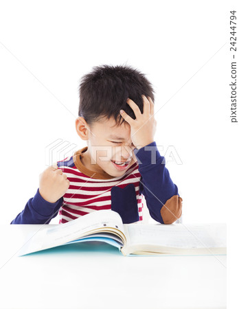 angry little boy hold head and make a fist 24244794