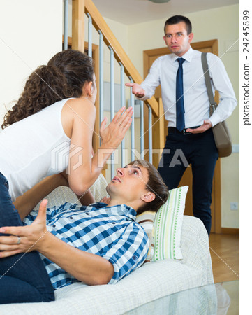 Man seeing girlfriend cheating on him. Man seeing girlfriend cheating on him. 24245899