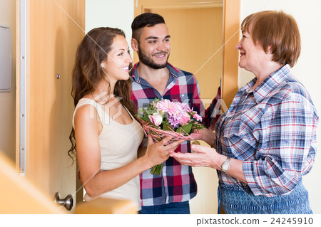 couple came to visit mother at the parental home couple came to visit mother at the parental home 24245910
