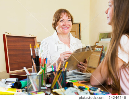 Elderly woman artist of creating a picture Elderly woman artist of creating a picture 24246246