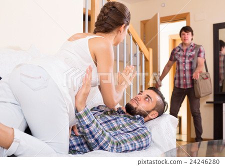 Husband watching how partner is cheating 24246280