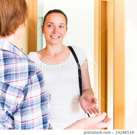 Mother smiling welcomes her daughter 24246519