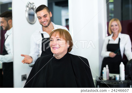 Elderly woman contented haircut 24246607