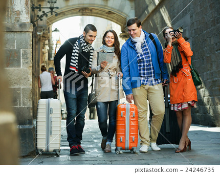 Friends with luggage outdoor 24246735