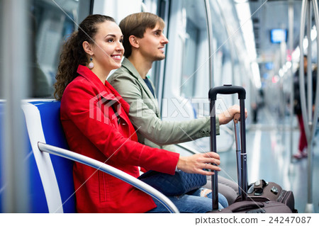 Portrait of metro passengers sitting in car seats 24247087