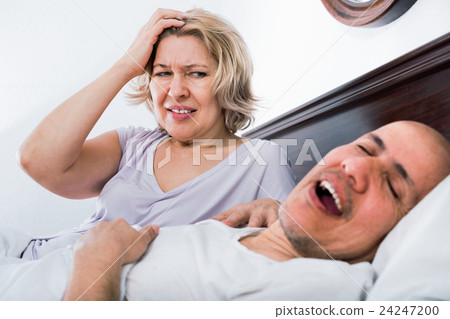 Mature woman disturbed with partner snores Mature woman disturbed with partner snores 24247200