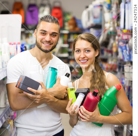 Couple with shampoo in the store. 24247314