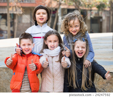 Group of children posing at urban street Group of children posing at urban street 24247592