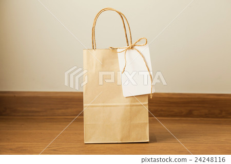 Empty shopping bag with card attached 24248116