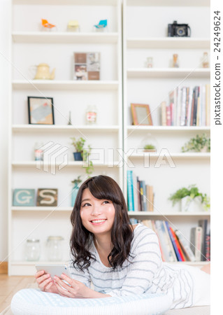 A young lady (a smartphone) 24249624