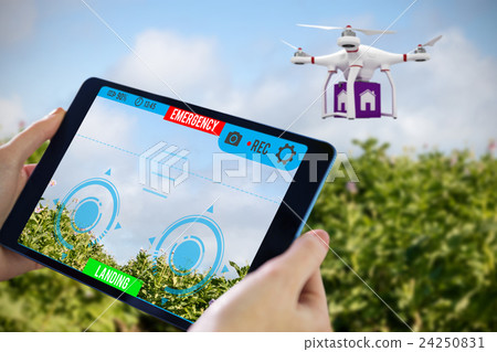 Composite image of hands holding tablet Composite image of hands holding tablet 24250831