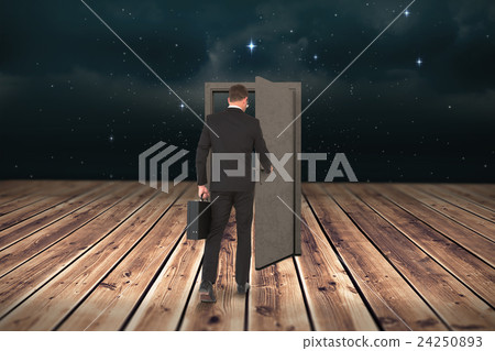 Composite image of businessman walking with his briefcase Composite image of businessman walking with his briefcase 24250893