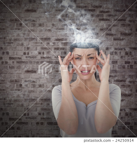 Composite image of brunette suffering from migraine  24250914
