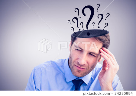 Composite image of stressed businessman holding his head 24250994
