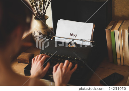 Blog against young woman using typewriter 24251050