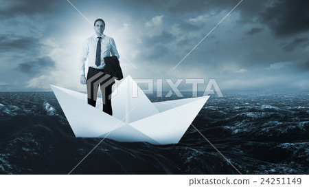 Composite image of handsome businessman looking at camera Composite image of handsome businessman looking at camera 24251149