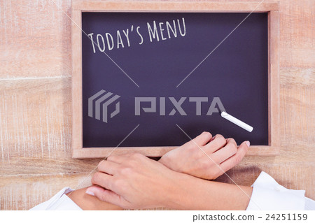 Composite image of hight angle of hand chef with blackboard 24251159