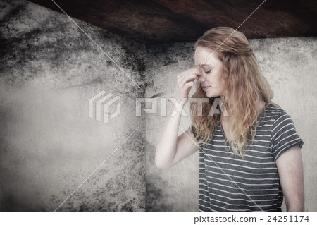 Composite image of blonde woman with headache pinching her nose Composite image of blonde woman with headache pinching her nose 24251174