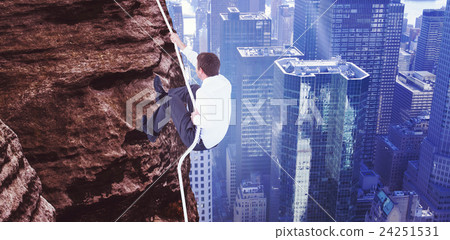 Composite image of businessman pulling a rope with effort 24251531