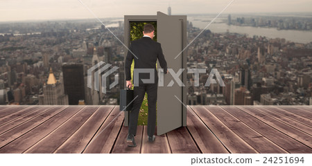 Composite image of businessman walking with his briefcase Composite image of businessman walking with his briefcase 24251694