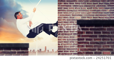 Composite image of businessman pulling rope while sitting on cube Composite image of businessman pulling rope while sitting on cube 24251701