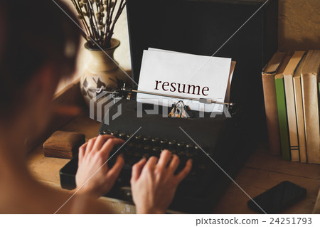 Resume against young woman using typewriter Resume against young woman using typewriter 24251793