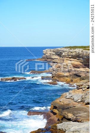 Rocky sandstone cliffs on NSW coast, Australia Rocky sandstone cliffs on NSW coast, Australia 24255011